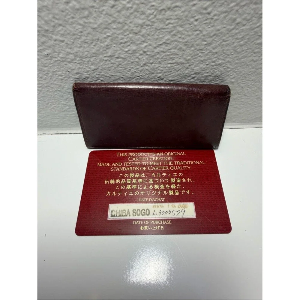 Cartier Brownish Red Leather Card Holder with Gold Corner Accents